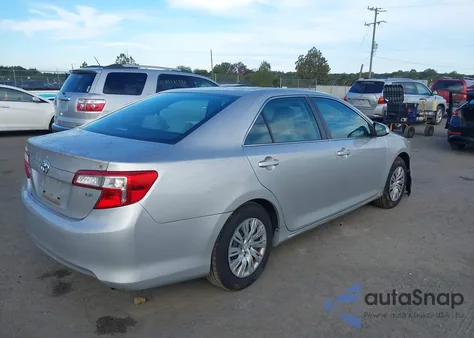 2014 Toyota Camry Le z USA, uszkodzony, nr VIN 4T1BF1FKXEU352844